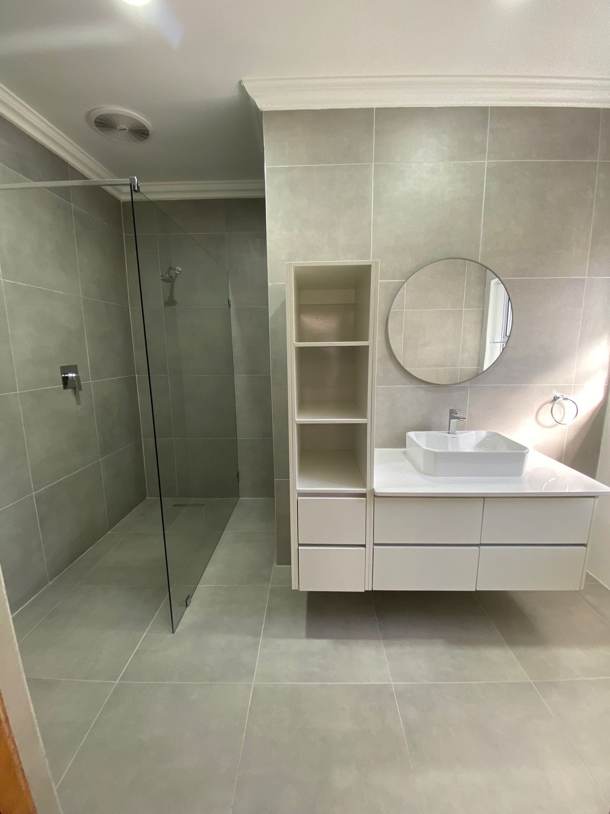 Walk-in shower with vanity